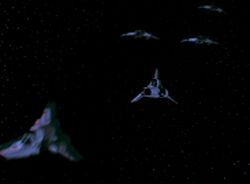 Zac et Apollo poursuivis par des chasseurs cylons.jpg